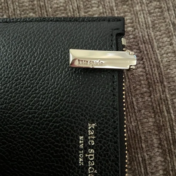 Kate spade bi-fold Spencer Slim in black with gold tone hardware. - Picture 4 of 6